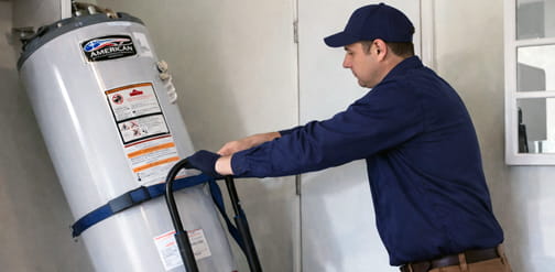 Plumber replacing residential water heater in Brentwood CA